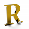 Polished gold anodized aluminum sign letter R.