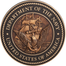 US Department of the Navy military seal in cast bronze metal with a 3D sculpted face.