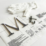 Polished solid aluminum division 10 architectural sign letter with back stud mounting template and hardware