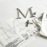 Polished solid aluminum division 10 architectural sign letter with back stud mounting template and hardware