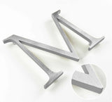 Random arc brushed solid aluminum division 10 architectural sign letter with finish closeup