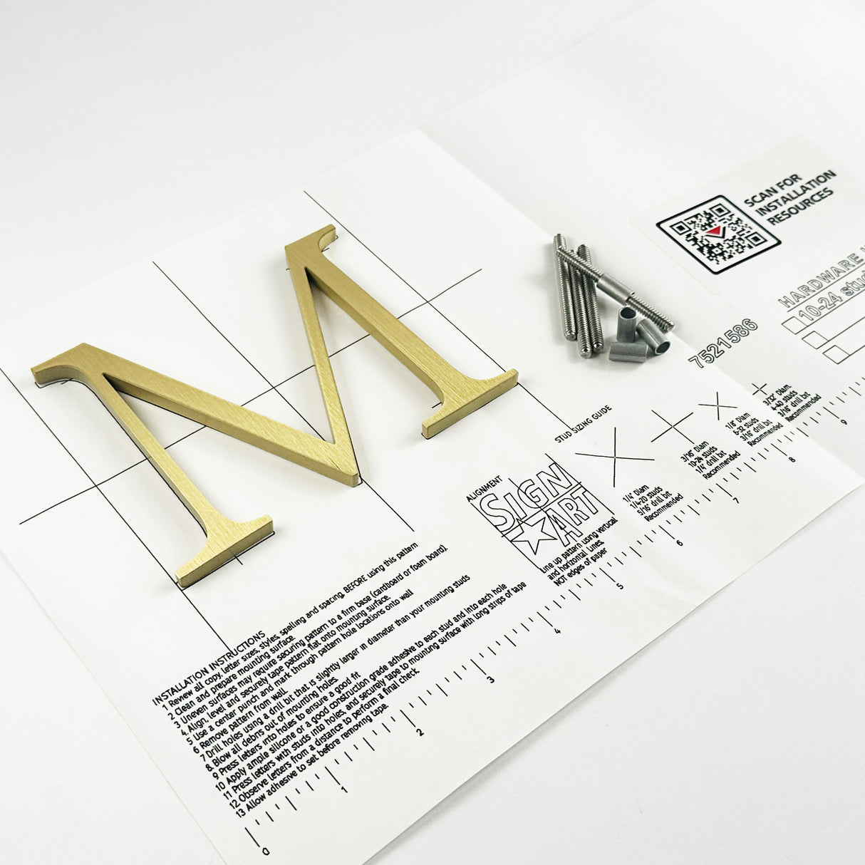 Brushed solid brass division 10 architectural sign letter on mounting template with hardware