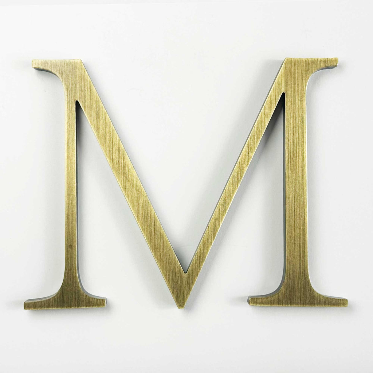 Lightly aged solid BAA & BABA certified brass division 10 architectural sign letter