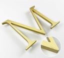 Vertically brushed solid BAA & BABA certified brass division 10 architectural sign letter with finish closeup