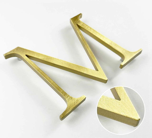 Random arc brushed solid BAA & BABA certified brass division 10 architectural sign letter with finish closeup
