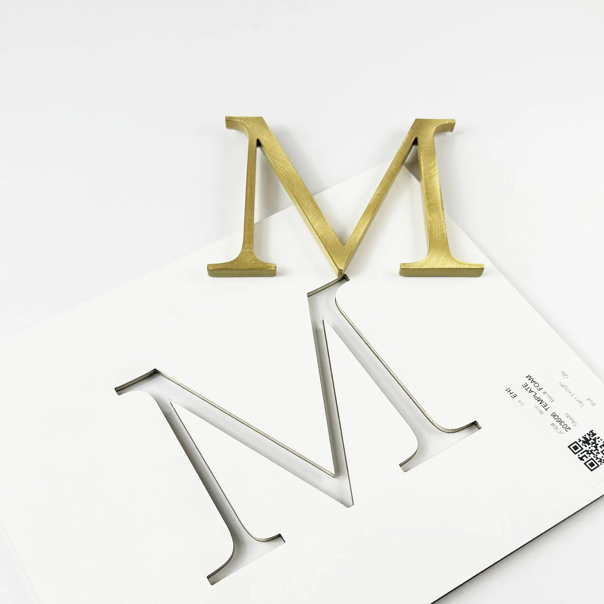 Random arc brushed brass division 10 architectural sign letter with double-sided tape on mounting template