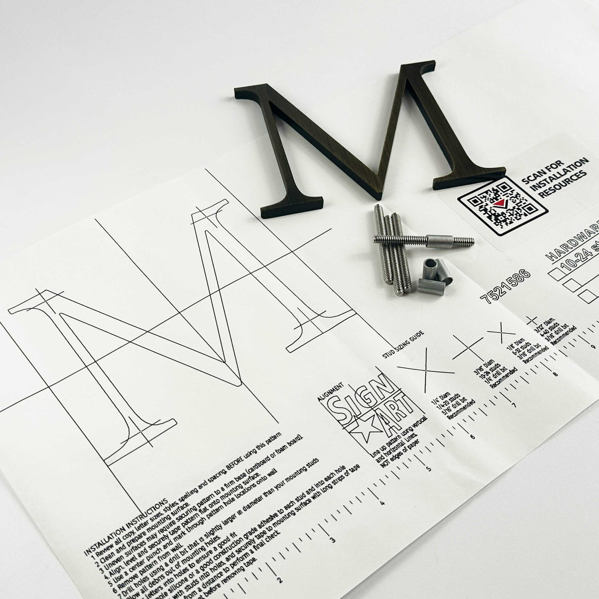 Heavily aged solid bronze division 10 architectural sign letter on mounting template with hardware