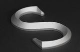 Prismatic faced cast aluminum sign letter