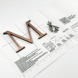 Light alt oxidized solid copper division 10 architectural sign letter on mounting template with hardware
