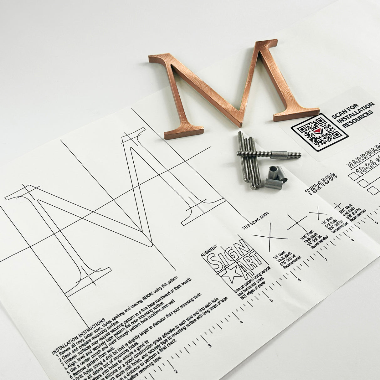 Random arc brushed solid copper division 10 architectural sign letter on mounting template with hardware