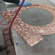 Creating a random arc finish on a copper sign