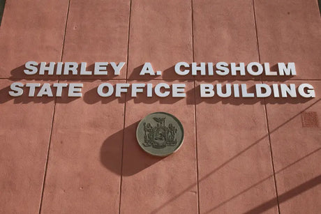Cast aluminum sign letters on a government building