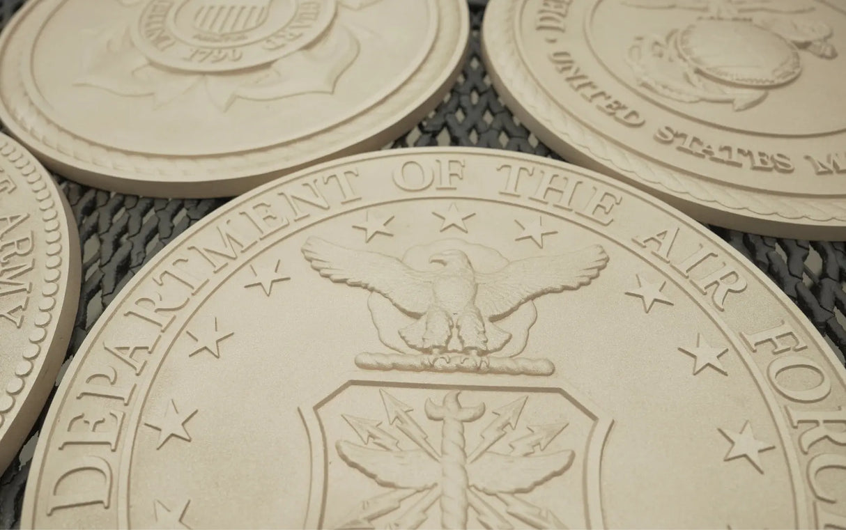 Primed castings of sculpted solid bronze BAA & BABA certified US military seals