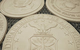 Primed castings of sculpted solid bronze BAA & BABA certified US military seals