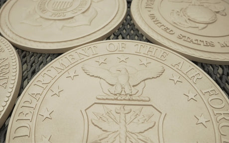 Primed castings of sculpted solid bronze BAA & BABA certified US military seals